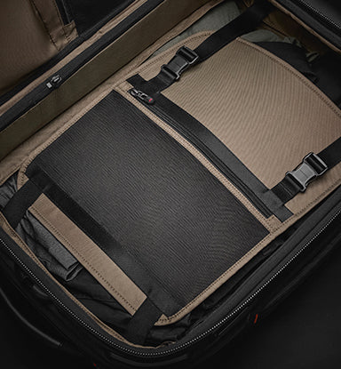 Open suitcase with compression panels