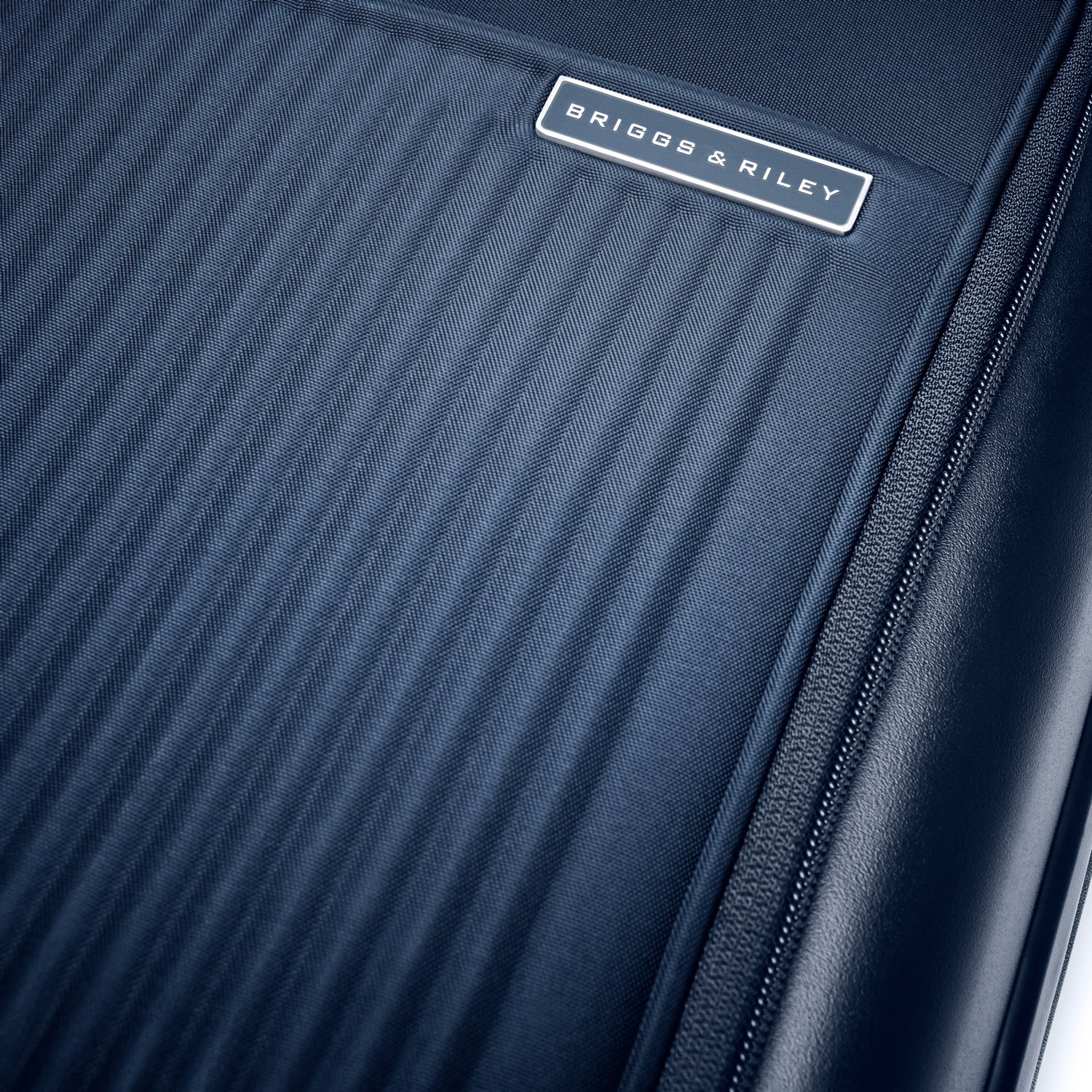 Essential Front Pocket Carry-On Expandable Spinner in Navy, Front View #colour_navy